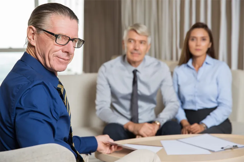 Attorney meeting with a couple at a consultation